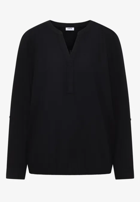 Schwarze, langärmlige Bluse mit V-Ausschnitt.